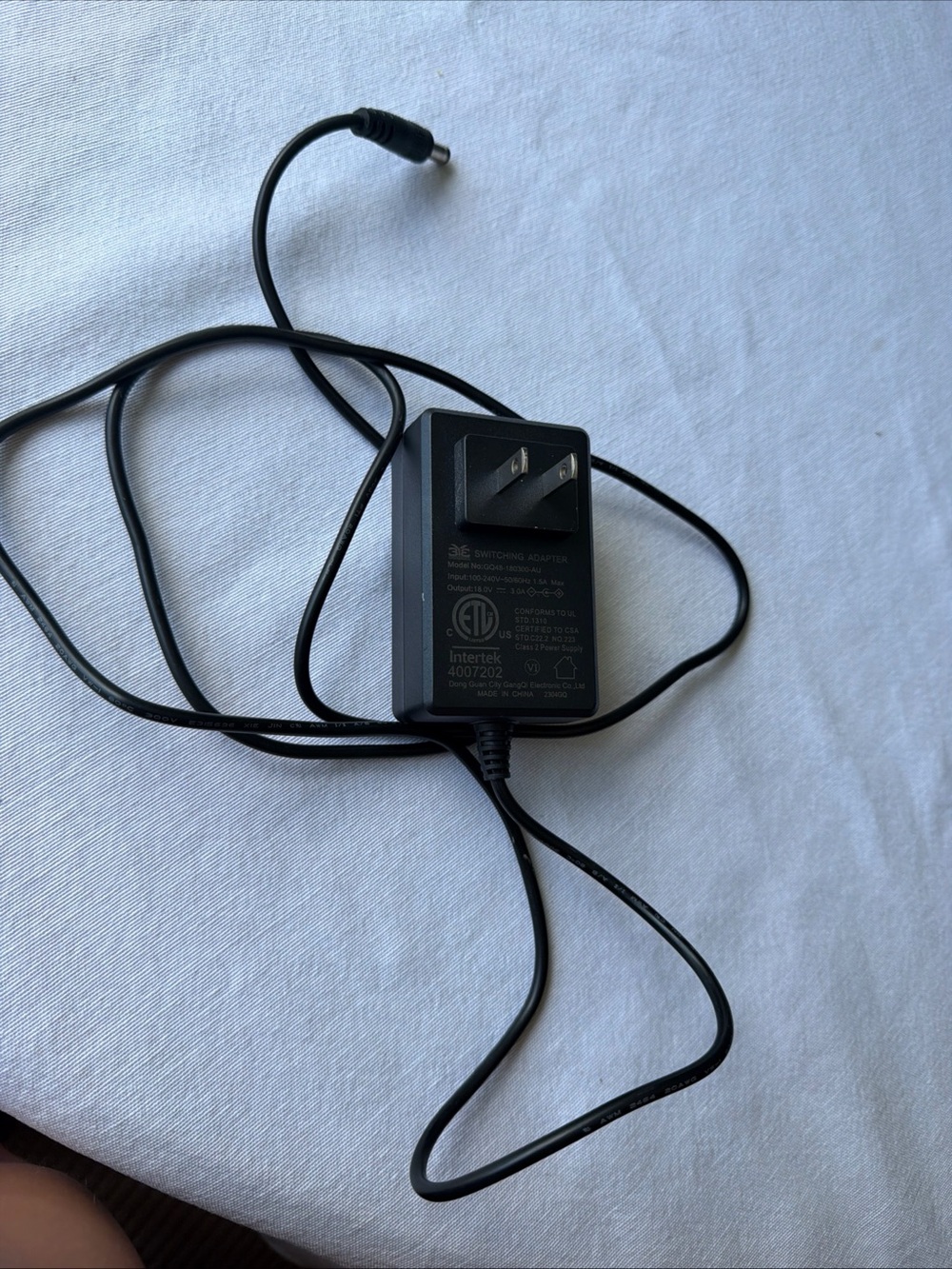 SWITCHING ADAPTER Model No: Gq48-180300-au 100-240V 50/60Hz 1.5A Max